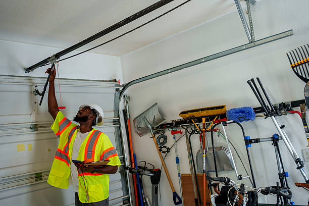 Professional Garage Door Panel Replacement technician working in Versailles, IN
